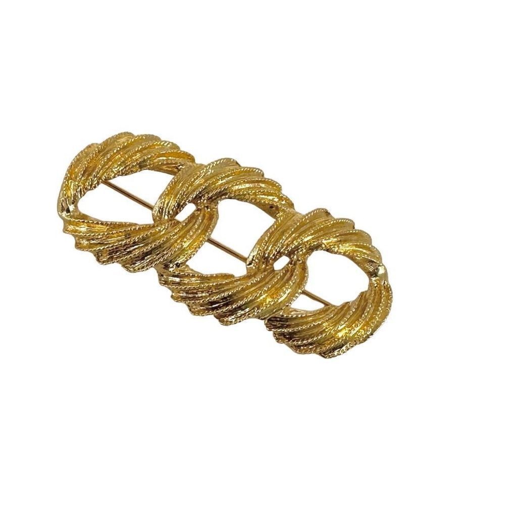 Vintage Napier textured three circle brooch